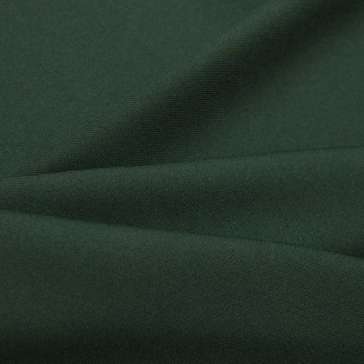 Ткань костюмная 21010 2076, 225 гр/м2, шир.150см, цвет т.зеленый - купить в Саранске. Цена 390.73 руб.